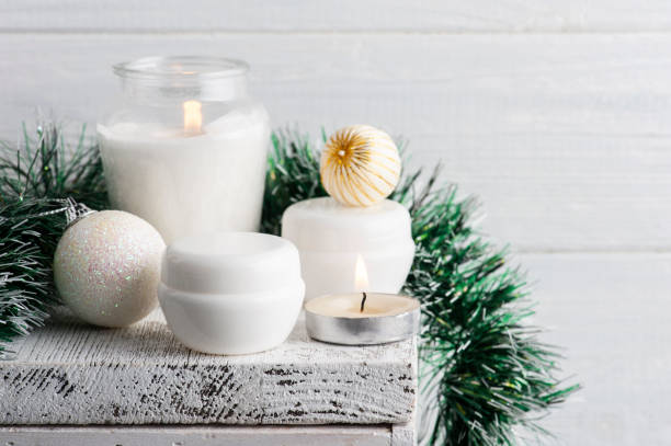 istock White jars in Christmas composition with lit candle 1283068301