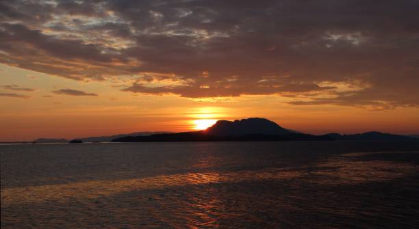 istock Colourful sunset in Skudeneshavn, Norway 1283070382