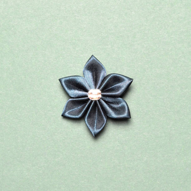 istock Close up of handmade fabric flower 1283070421