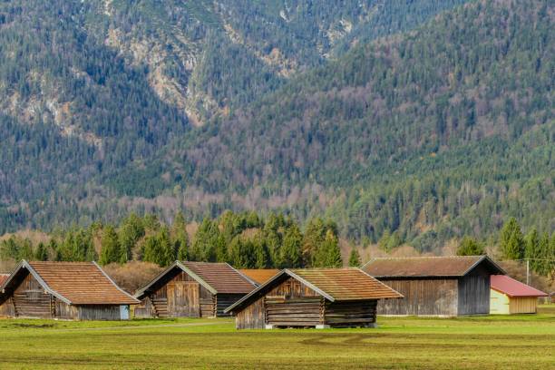 istock Wooden Huts in Countryside Alps Bavaria 1283070792