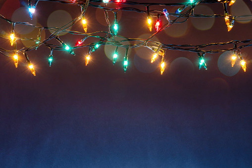 Christmas Lights On Blue Background With Copy Space Stock Photo - Download  Image Now - iStock