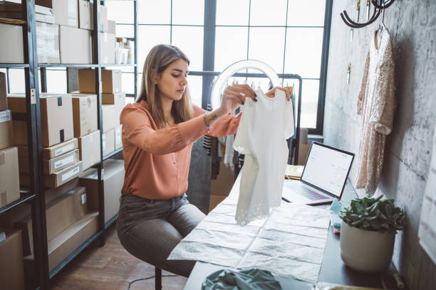 istock Young woman running online store 1283076296