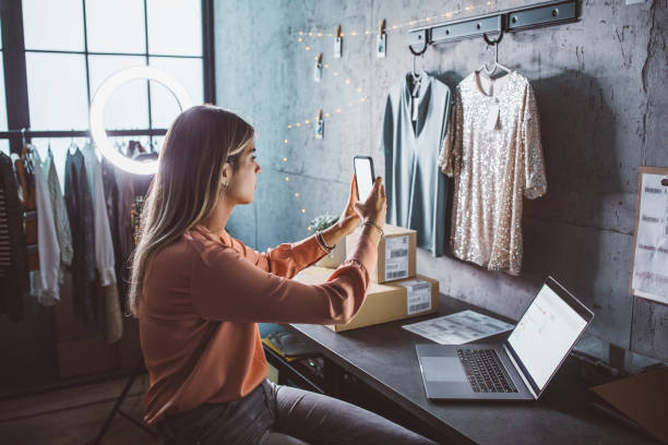 istock Young woman running online store 1283076333