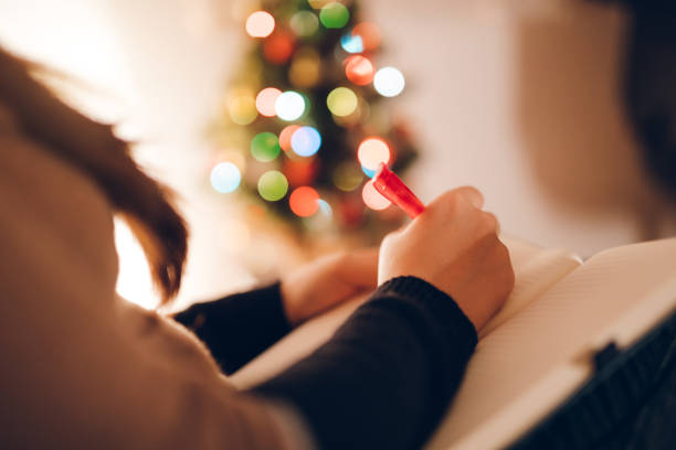 istock Woman writing something down in day planner 1283078542