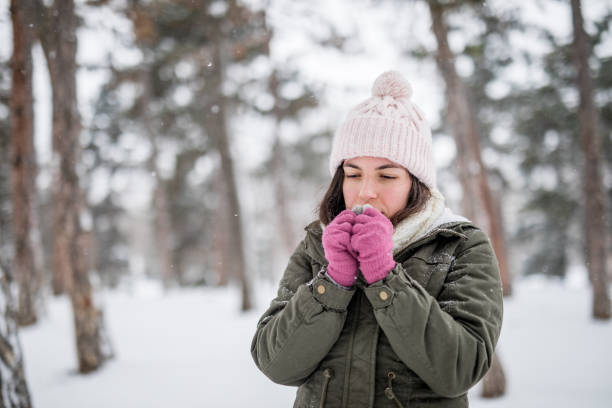 istock Woman filling cold in snow 1283079480