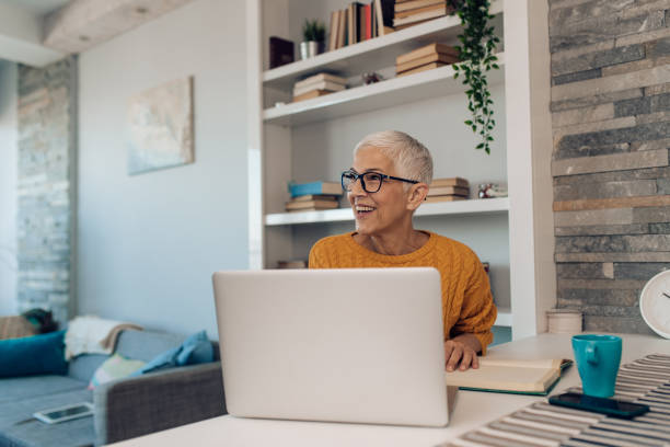 istock Mature entrepreneur working from home 1283079551