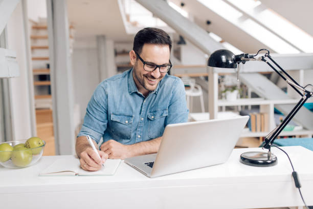 istock Young businessman working from home 1283080642
