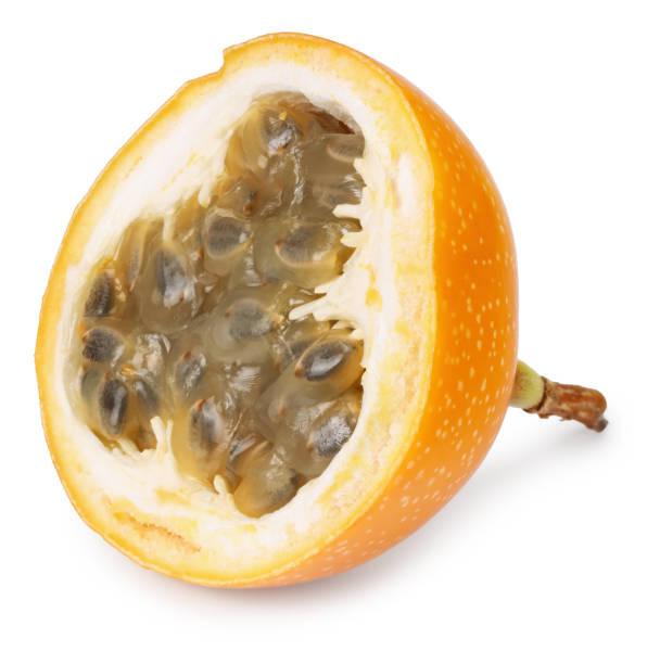 istock sliced granadilla or yellow passion fruit isolated on white background. exotic fruit. full depth of field 1283082501