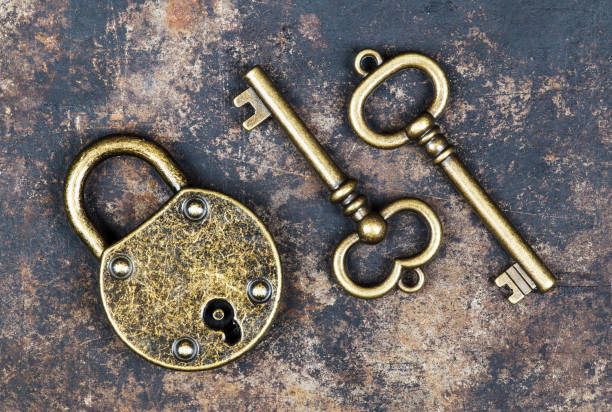 istock Escape room game concept, vintage keys and a padlock 1283085516