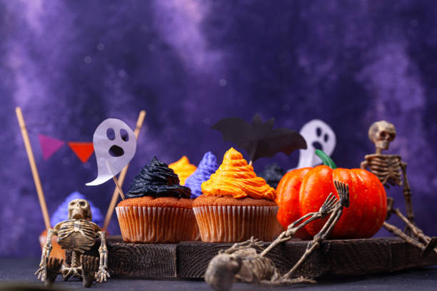 istock Halloween cupcakes with color cream 1283087138