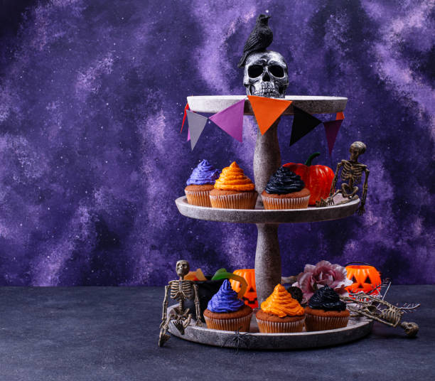 istock Halloween cupcakes with color cream 1283087150