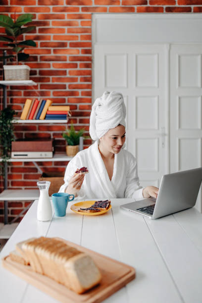 istock Beautiful woman has breakfast at home 1283087517