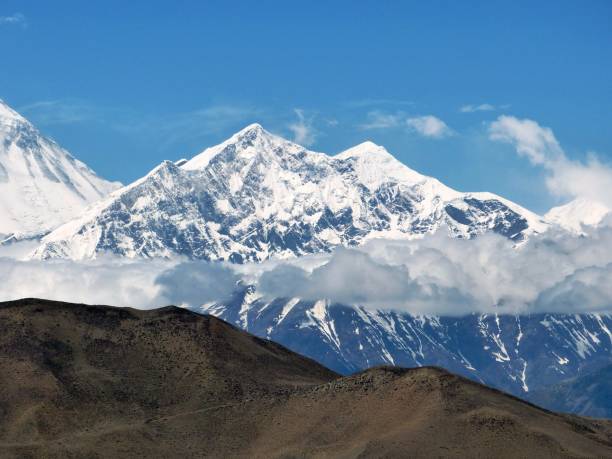 istock Great Himalayan mountains range in Mustang, Nepal.Spectacular view on gorgeous snow Mount Annapurna. Mystical place. Himalayas nature. Unique natural beauty. Awesome mountainous landscape. Place for soul and meditation. 1283093178