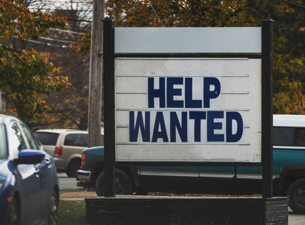Help Wanted Sign Roadside help wanted sign during the COVID-19 pandemic. help wanted sign photos stock pictures, royalty-free photos & images