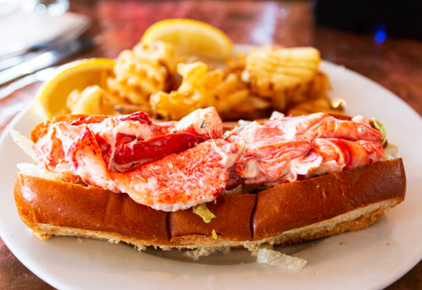 istock Maine lobster roll on a plate with waffle fries 1283094353