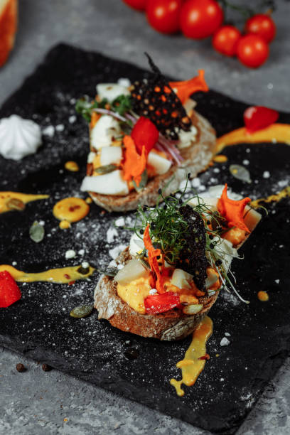 istock bruschettas with pumpkin mousse and goat cheese. Light breakfast, snack. halloween 1283094939