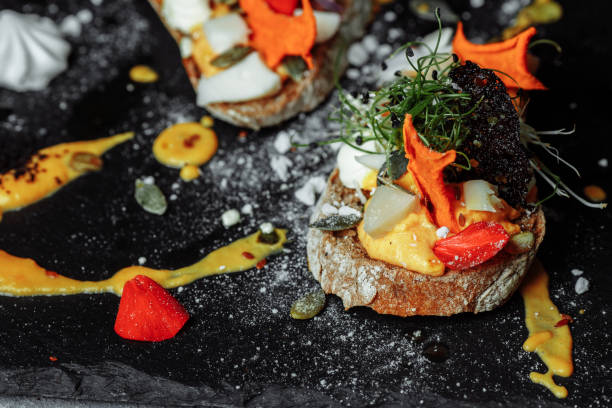 istock bruschettas with pumpkin mousse and goat cheese. Light breakfast, snack. halloween 1283094956