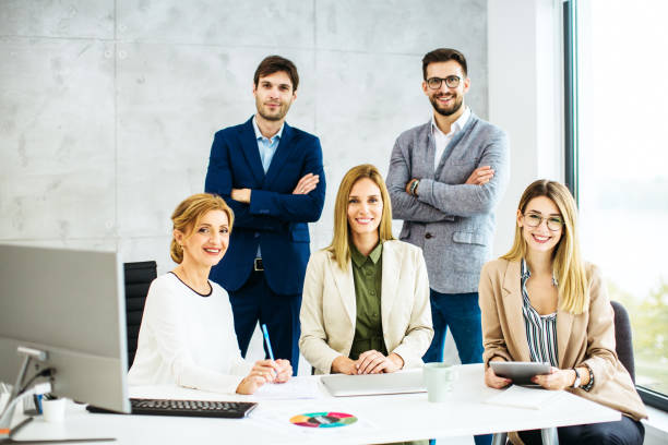 istock Group of business people working inside modern office 1283095714