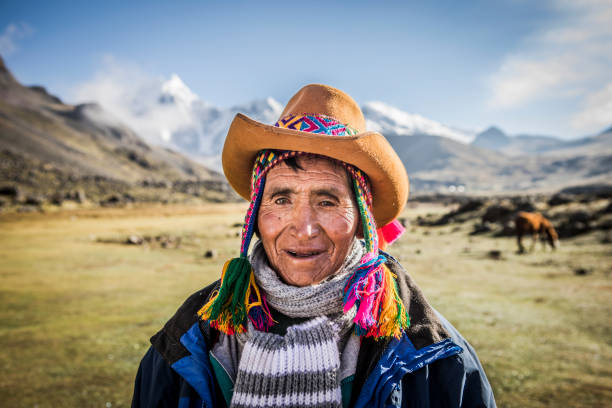 Portrait of Quechua man in traditinal hat. stock photo