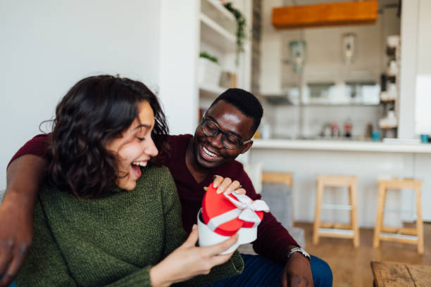 istock Interracial young couple celebrating Valentine's day 1283097267