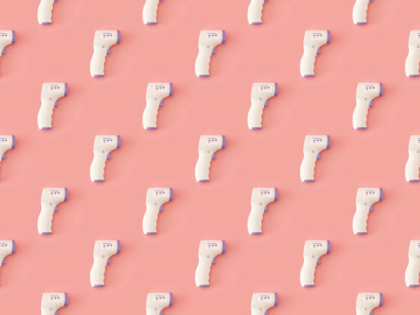 istock Seamless repetitive Digital Temperature Gun pattern on pink background 1283099298