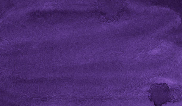 istock Purple patchy watercolor background. Abstract violet background drawn by hand with a brush. Watercolor texture. 1283099387