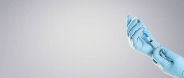 istock Hand holding viol with vaccine against corona virus. 1283099727