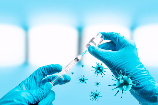 istock Hand holding viol with vaccine against corona virus. 1283100235
