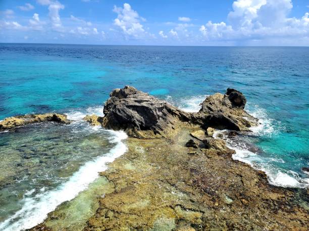 istock Island women coral reef 1283102695