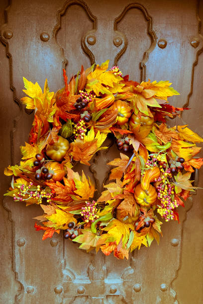 istock Autumn/Halloween Wreath with Pumpkins 1283103730