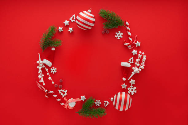 Christmas Decoration on red background with copy space Christmas Decoration on red background with copy space wreath photos stock pictures, royalty-free photos & images