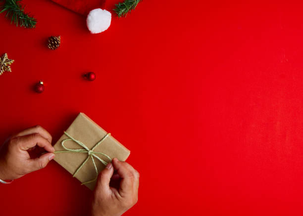 istock Flat lay Creative composition of Man holding Christmas gift box 1283108257