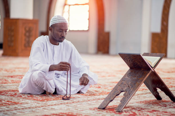 istock Religious black Muslim man praying inside the mosque 1283119109