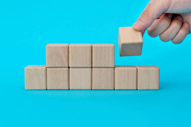 istock One of the group blocks turns one side 1283123151