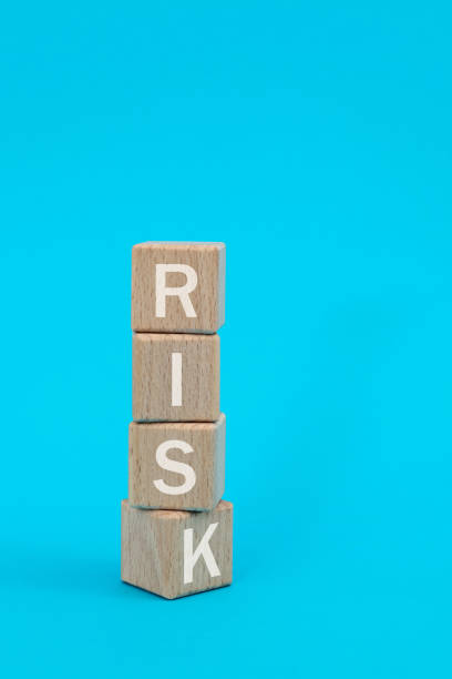 istock Wooden cubes with word risk 1283123217