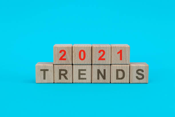 istock Wooden blocks with word 2021 trends 1283123894