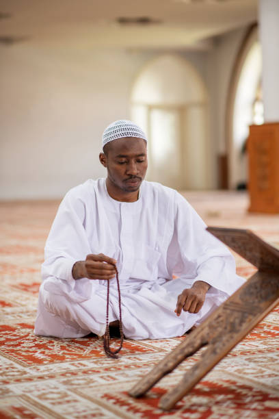 istock Religious black Muslim man praying inside the mosque 1283124846