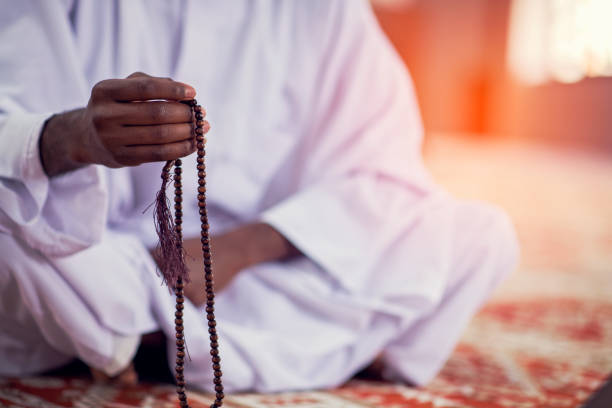 istock Religious black Muslim man praying inside the mosque 1283125773