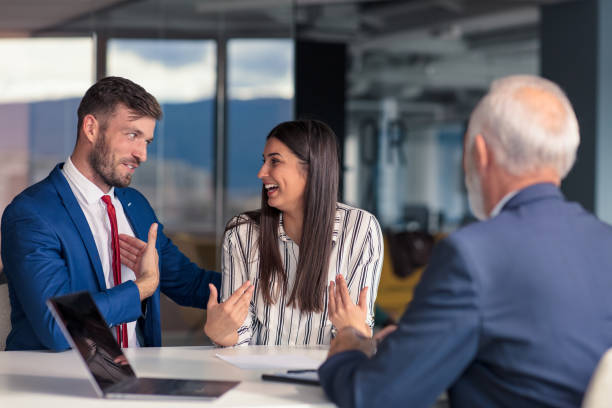 istock Positive aged couple consulting with insurance agent 1283125824