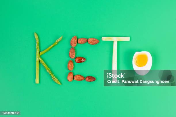 Keto Arrangement Of Organic Asparagus Almond Broccoli And Boiled Egg On Green Background Weight Loss Healthy Food Ketogenic Diet Low Carb And Vegetarian Concept Stock Photo - Download Image Now