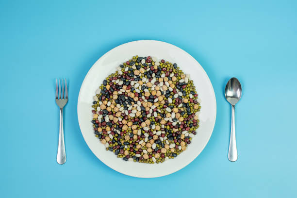istock Organic mixed Beans; Green, Black, Red, White and Chick pea on plate 1283129816