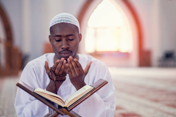 istock Religious black Muslim man praying inside the mosque 1283130985