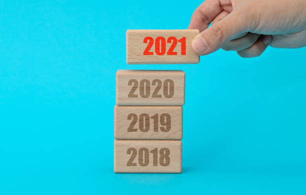 istock 2018, 2019, 2020, 2021 written on wooden blocks 1283132545