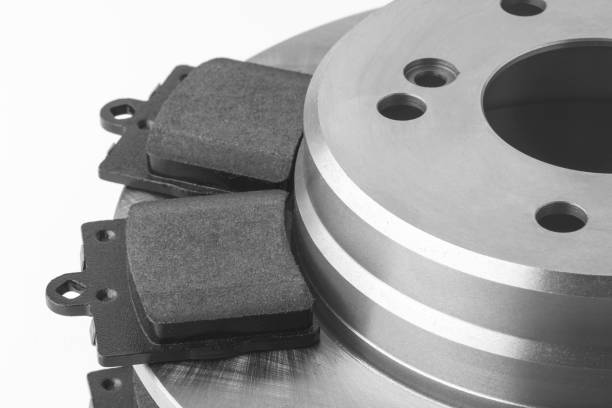 istock New car brake disc and brake linings on white background 1283134909