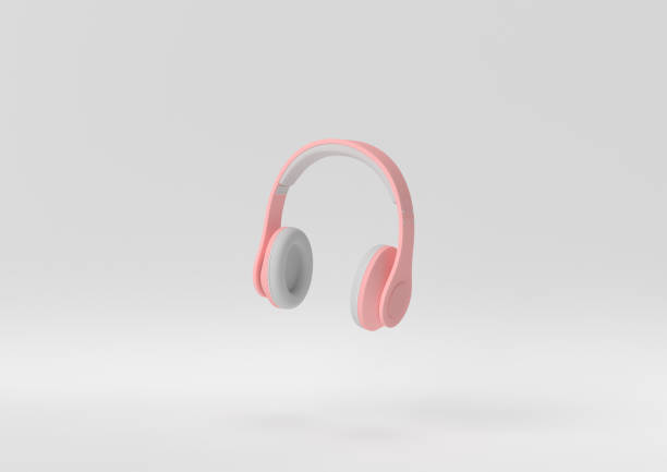 istock Creative minimal paper idea. Concept white and pink headphone with white background. 3d render, 3d illustration. 1283134947