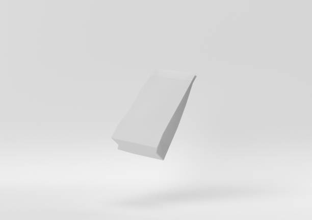 istock Creative minimal paper idea. Concept white paper bag with white background. 3d render, 3d illustration. 1283134954