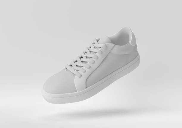 istock Creative minimal paper idea. Concept white shoe with white background. 3d render, 3d illustration. 1283135202