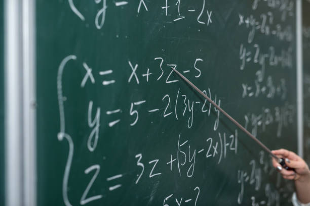 istock Mathematical formulas are written on the blackboard 1283140185