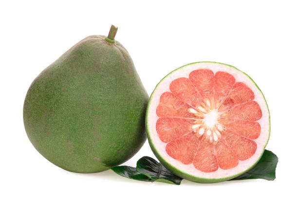 istock Red Pomelo citrus fruit with leaves isolated on white background 1283141010