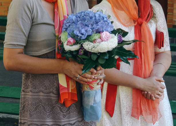 istock Woman holding bouquet 1283141038